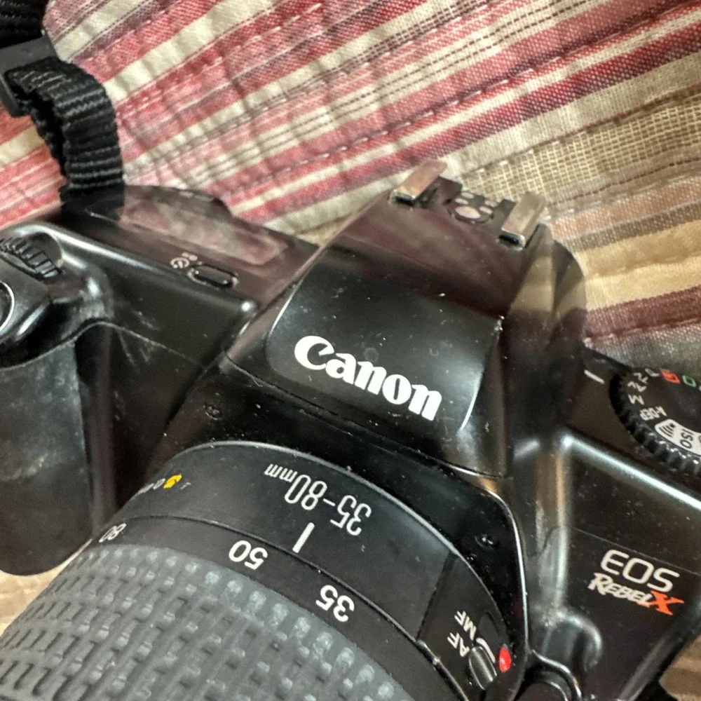 Canon EOS Rebel X 35mm SLR 35-80mm Lens Neck strap Lense Cover Not Tested READ